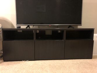 Excellent condition tv stand with storage and glass on top