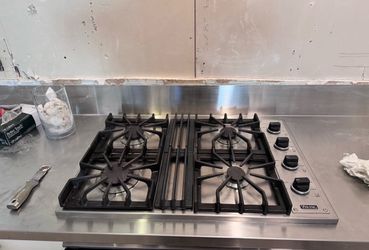 Viking cooktop w thermador oven