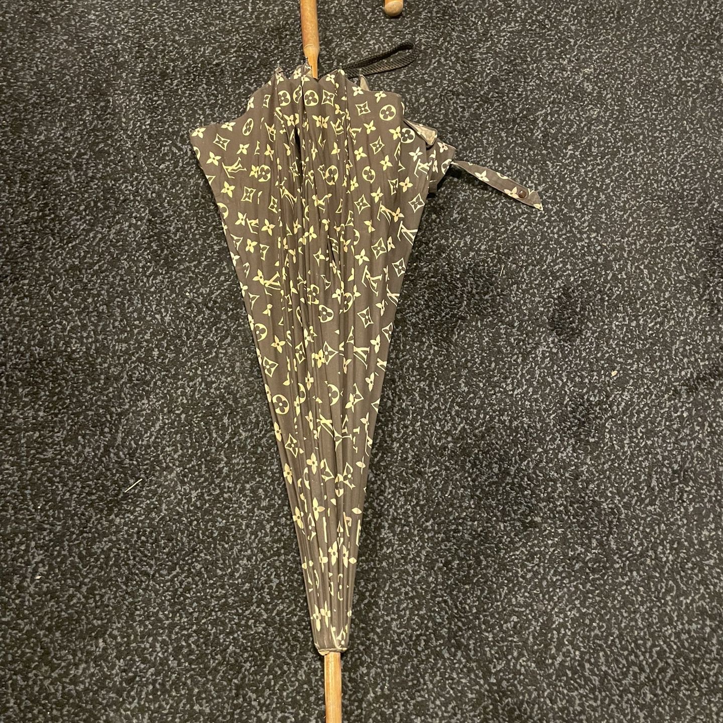 Sold at Auction: Faux Louis Vuitton Umbrella in the traditional brown  shade with logo pattern and wooden handle.