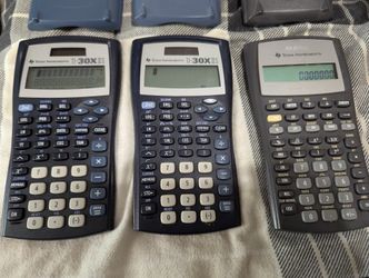 Three Texas Instruments Calculators