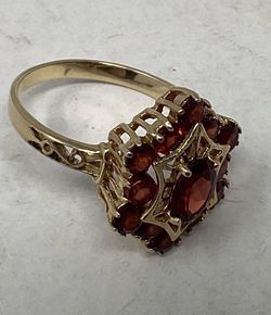 Unique ring! 10k red stones