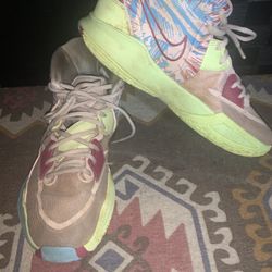 Nike Kyrie Infinity basketball shoes in '1 World 1 People' colorway (Light Soft Pink/Barely Volt/Orchid/Sweet Beet)