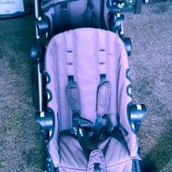 NICE City Select baby jogger stroller with a second seat. This running baby buggy Is Black + Gray.