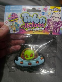 Taba-licious plushy and holographic. Have alot