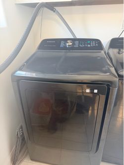 Dark grey Samsung washer and dryer