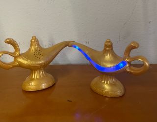 Aladdin Genie Lamp Toys Set of 2: Pair Of Disney Live Action Aladdin Singing & Talking Genie Light Up Lamp Collectables!
