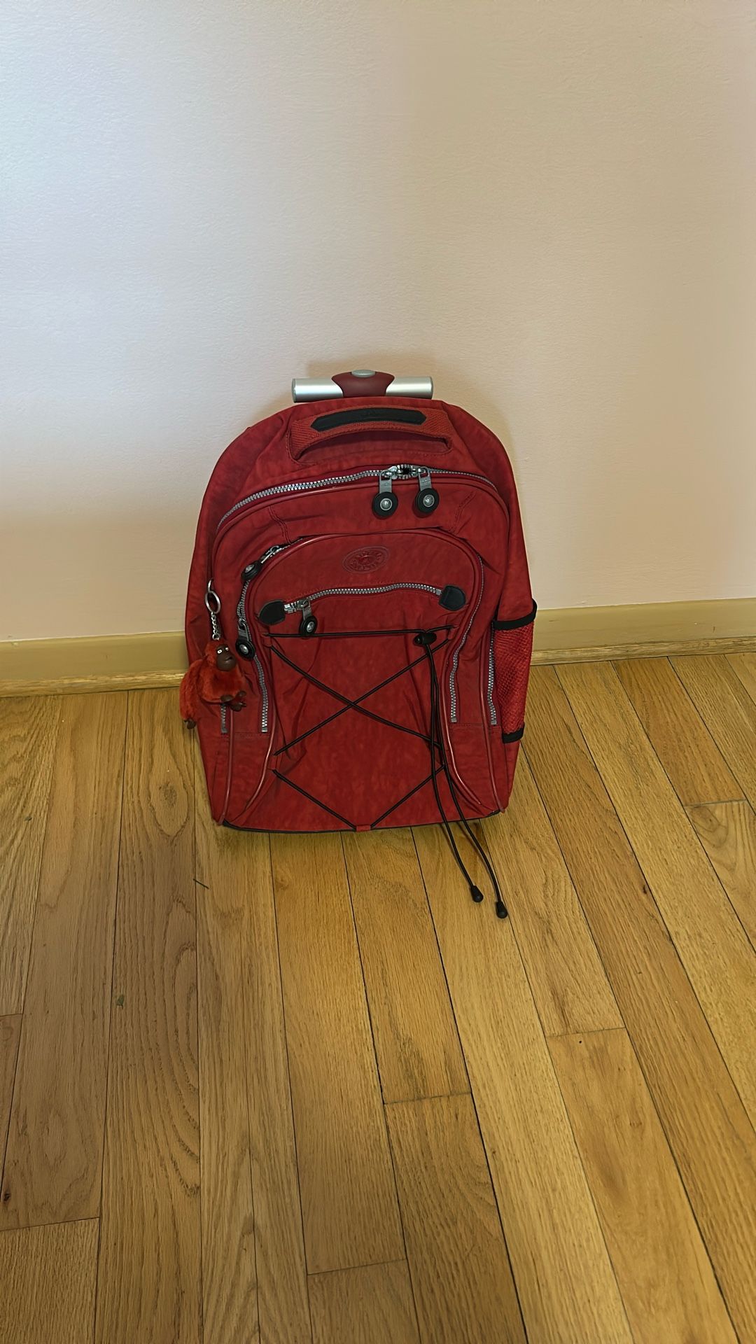 Kipling rolling backpack
