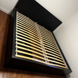 MALM Bed frame, dark brown veneer/Lönset, King USED