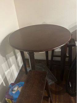 Bistro table with two matching barstools