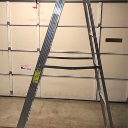 WERNER 8ft Aluminum  ladder use 1 time has never  been used outside 