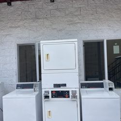 Two coin op washer and stack dryer