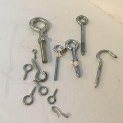 Assorted screw eyes bolts