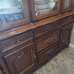 storage shelf on the bottom and on the top is a display area