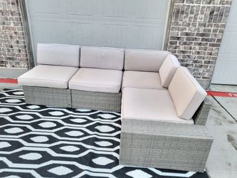 4 large  pieces wicker sectional.