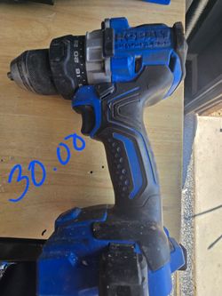 Drill with charger and battery