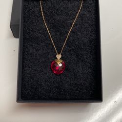 Ruby Pendant.  Heart Set In 10 Karat Gold.  18” Chain Is 14k Gold