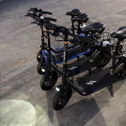 Phantom R1 seat electric scooter.  The maximum speed can reach 15.5 mph.  The range is 20 miles when fully charged.  Equipped with 12-inch front and r