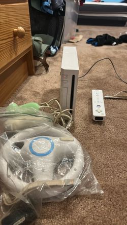 Nintendo Wii Console with Remote and Accessories