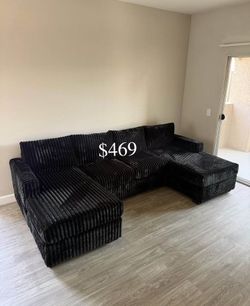 Stylish black sectional with double chaise Fur-Like Jumbo Corduroy new in box