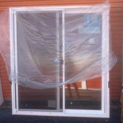 JELD-WEN V-2500 72-in x 80-in x 4-9/16-in Jamb White Vinyl Right-hand Sliding Patio Door with Low-E argon...