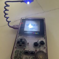 Purple Gameboy Color With Wormlight