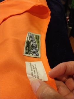 Two orange hunting safety vests