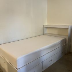 Twin bed frame with drawers and foam mattress 