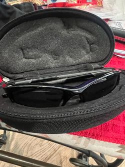 Pair of Oakley sunglasses