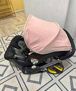 Pink Doona Stroller