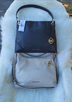 Mk Originales Nuevas $140, por las dos.