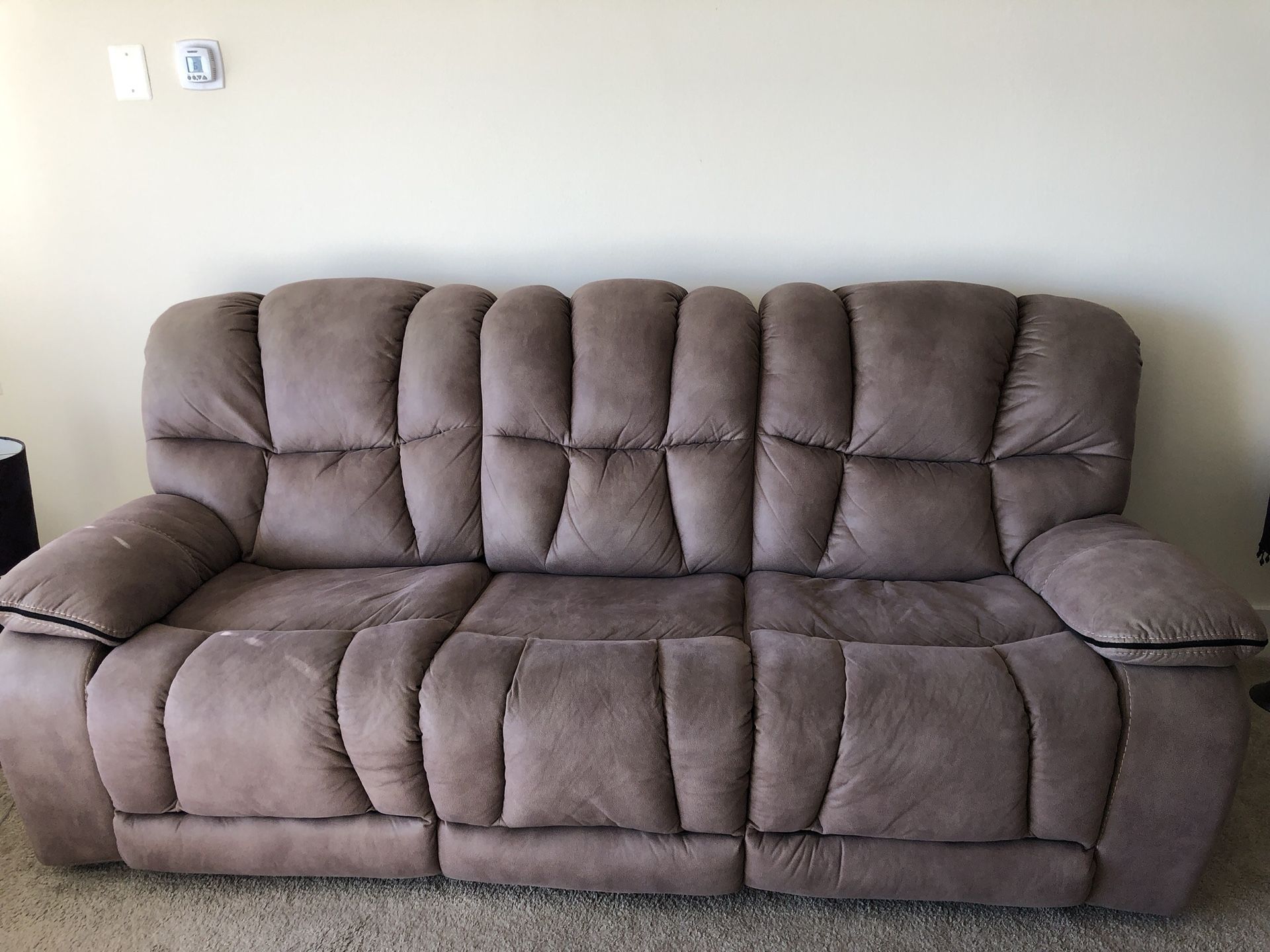 Power reclining sofa and love seat ( Bob’s furniture ) for sale