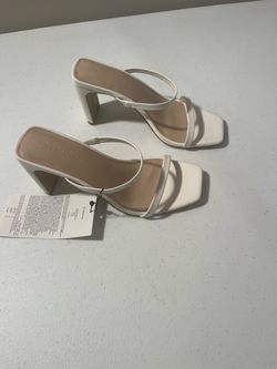 New white sandals with tag
