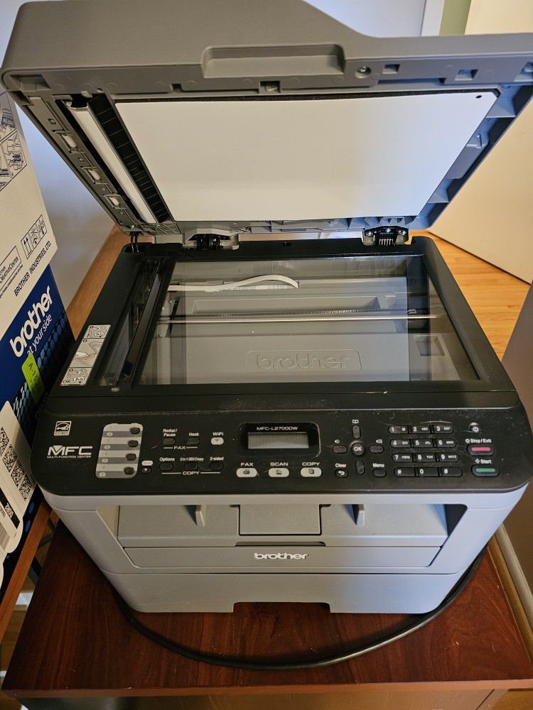 Brother B&W printer/scanner/fax with 2 brand new toner cartridges