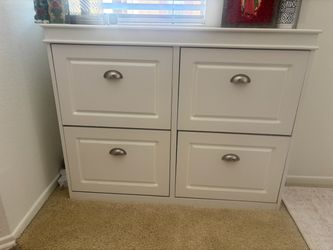 White 4-Drawer Dresser with Silver Cup Pulls