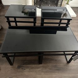 black glass table with side tables