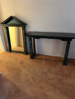 Black marble table with mirror