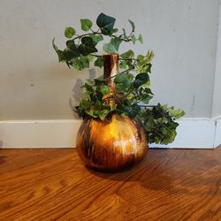 Vase With Plant Around It