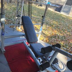 OLYMPIC WEIGHT BENCH  LEG EXTENSION  ADJUSTABLE INCLINE  AND  BAR HEIGHT.   7'  45LB BAR  WITH CLIPS 
11525 S  HALSTED DUNKIN DONUTS/7111.S WESTERN WA