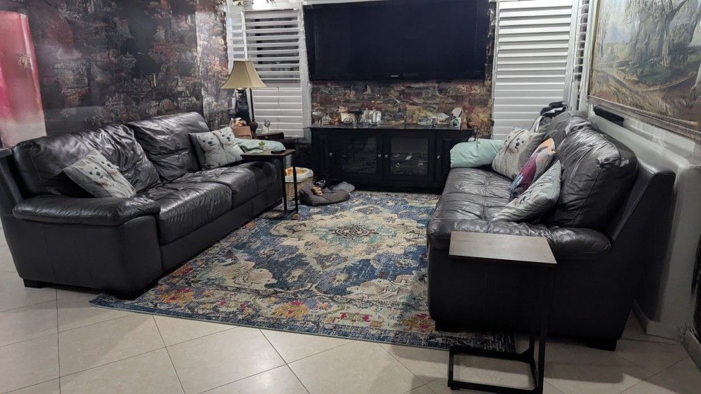 2 Matching Gray Leather Couches - will seperate