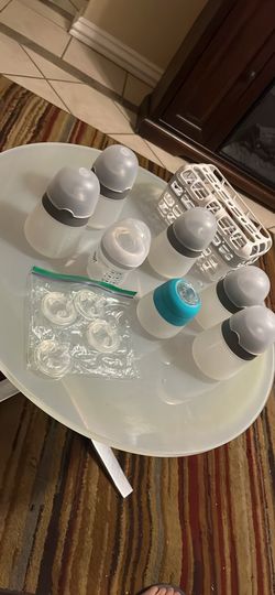 Seis. Biberones Nano bebé, cuatro tetilla y un accesorio Para Lavar Los Accesorios Pequeños En La Lavadora De Platos