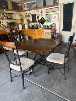 Set of Beautiful Dining Table With Sturdy Metal Legs & 4 Matching Chairs by Ashley Furniture Industries Inc.