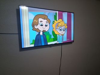 Couch and 55 inch smart tv