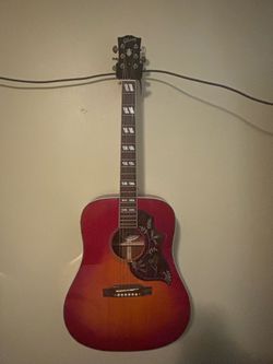 Chibson and chender acoustic.