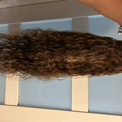 Highlighted refurbished curly wig