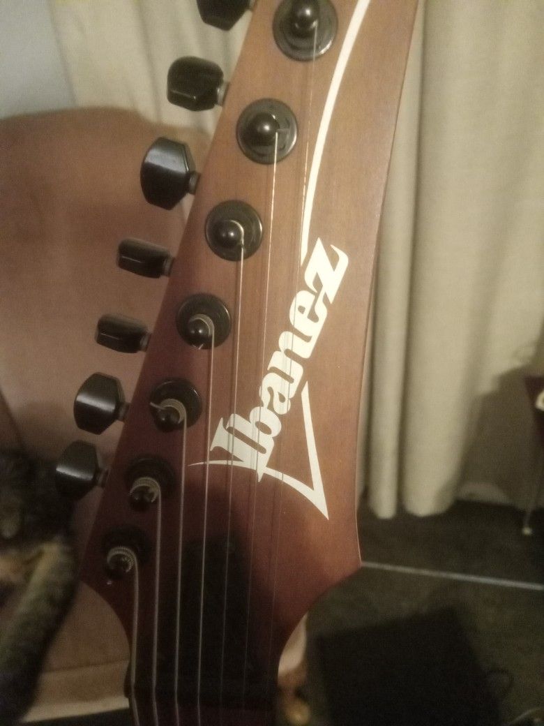 Ibanez Electric Guitar With Fender Amp