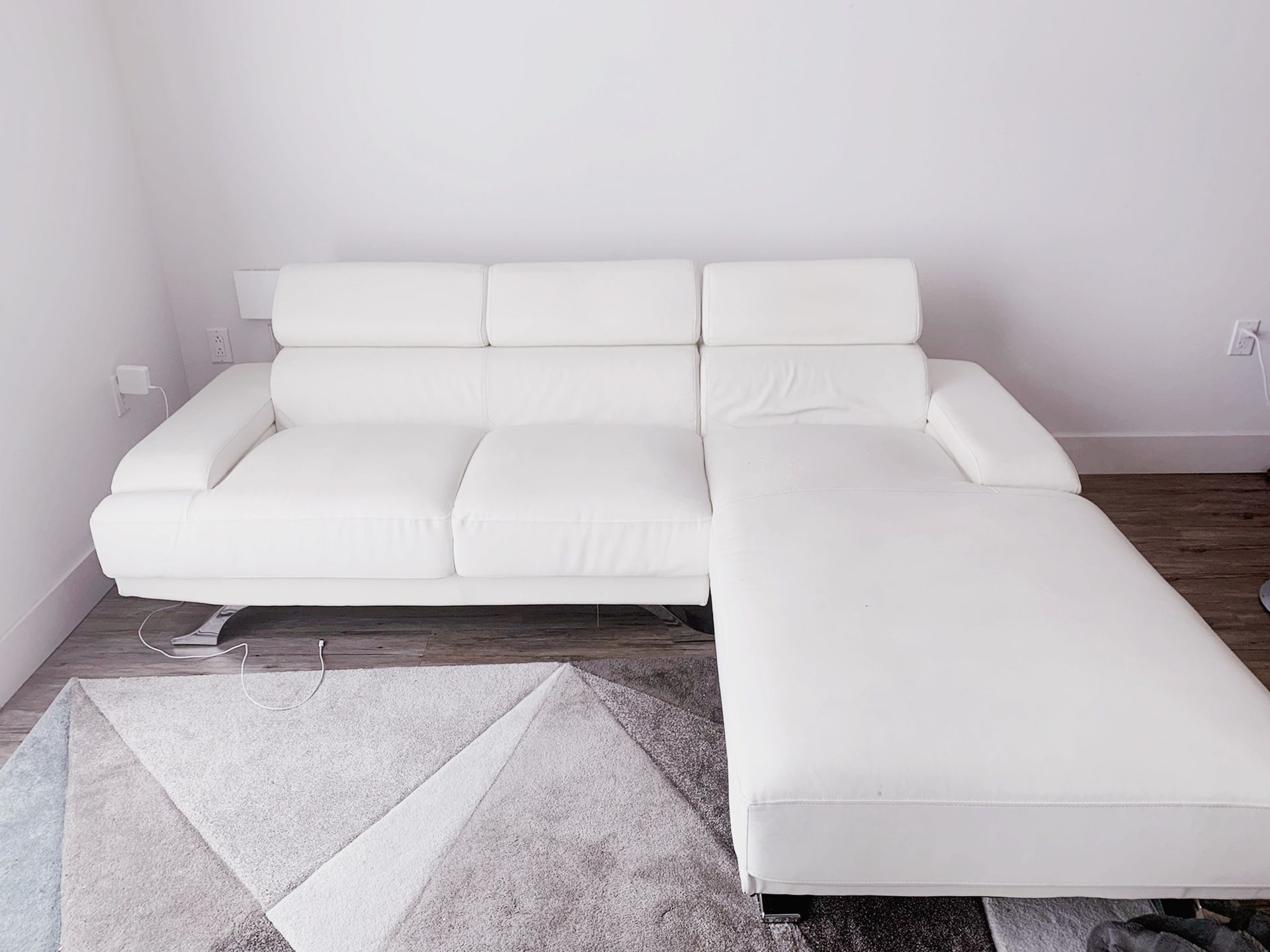 White leather LHS extension couch with adjustable back support of potterybarn