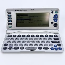 Sharp Wizard OZ-730 Silver Handheld Portable Electronic Organizer Vintage