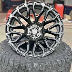 Fuel FC899 chisel 20x10 6x139.7 -18 black with 33x12.50r20 mud tires available in stock we finance