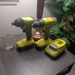 Ryobi Drill Set With 2 Drills And 2 Batteries And The Charger 