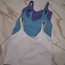 3 Sport Bra Lululemon size # 2,4.